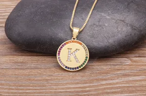 Gold initial K necklace with colorful cubic zirconia pavé round pendant dainty jewelry.