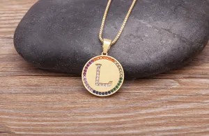 Gold plated copper letter L pendant necklace with colorful cubic zirconia border and chic chain.