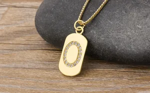 Gold letter O pendant necklace with cubic zirconia, elegant copper jewelry for daily wear