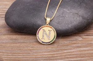 Gold-plated letter N pendant necklace featuring colorful cubic zirconia pavé crystal stones.