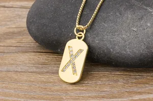 Gold letter X pendant necklace, 18k gold plated copper with sparkling cubic zirconia.