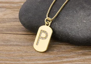 Gold plated letter P pendant necklace with sparkling cubic zirconia, elegant jewelry item.