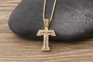 Gold-plated letter T pendant necklace with colorful micro-pave cubic zirconia details.