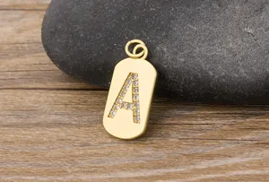 Gold initial letter A pendant necklace with sparkling cubic zirconia, elegant jewelry charm.