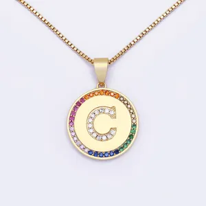 Gold-plated initial C pendant necklace featuring a colorful rainbow cubic zirconia pavé border.