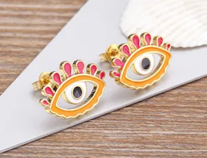 Enamel evil eye stud earrings detail view, gold plated copper creative fashion jewelry accessories.