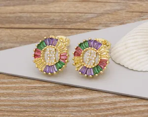 Detail shot of colorful cubic zirconia letter B stud earrings with 18k gold plated finish.