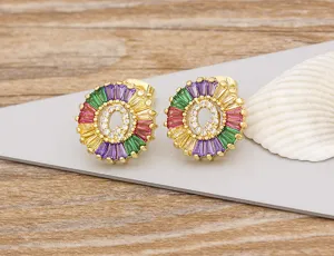 Gorgeous 18K gold plated letter Q stud earrings featuring colorful baguette crystals and zircon.