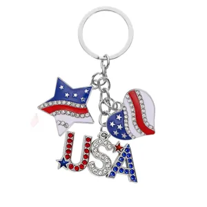 Close-up detail of the patriotic American flag themed metal rhinestone keychain pendant.