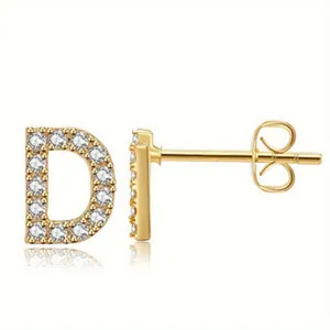 Gold letter D crystal stud earring detail view, pavé rhinestone stainless steel post jewelry.