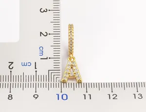Gold plated letter A zircon pendant detail showing size measurements for classic earrings.