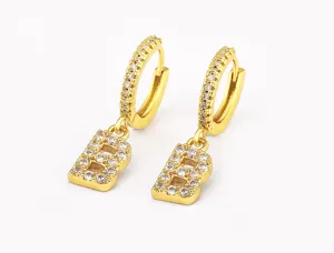 Close-up of paved cubic zirconia letter B pendant hoop earrings in gold plated brass.