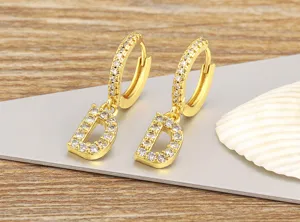 Exquisite 18K gold plated micro-pave cubic zirconia letter D hoop earrings for women and girls.
