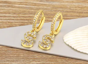 Gold plated cubic zirconia letter S hoop earrings, elegant dangle design for women daily wear.