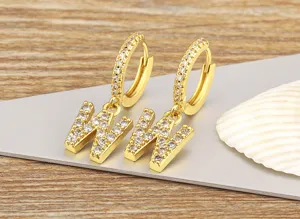Gold plated letter W zirconia hoop earrings detail view fashion jewelry accessories.