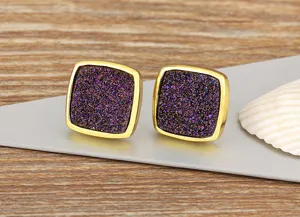 Chic vintage square earrings with gold frame and purple crystal texture, elegant and stylish.