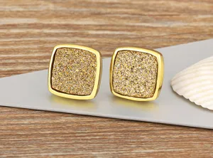 Vintage square natural ore earrings with gold metal frame, retro trendy detail view.