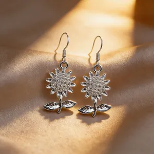 Exquisite rhinestone sunflower hook earrings detailed close-up, silver flower jewelry style.