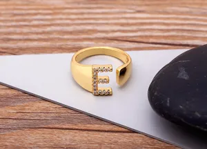 Gold plated letter E initial ring with cubic zirconia stones, adjustable open ring jewelry.