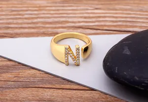 Gold plated 18K initial N alphabet ring with sparkling cubic zirconia for women and girls daily wear.