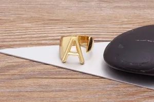 Gold plated open initial letter A ring for men and women fashion jewelry accessory.
