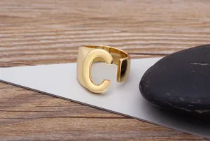 Gold plated open letter C ring detail view, chunky geometric initial finger jewelry for daily.