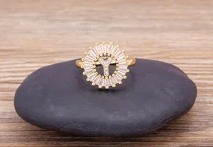 Close-up of 18k gold plated copper initial Y ring sparkling zircon stones elegant detail view