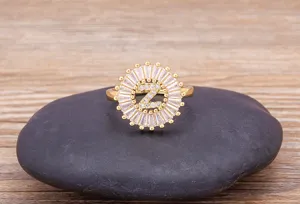 Detailed view of 18K gold plated copper circular zircon ring featuring letter Z.