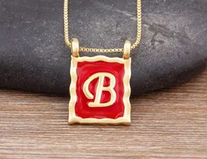 Gold plated red enamel letter B square pendant necklace, vintage style clavicle chain detail.