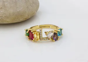Anello aperto con lettera L in zircone cubico colorato placcato oro 18K da donna