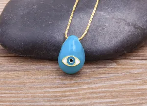 Gold plated blue evil eye teardrop pendant necklace for women fashion jewelry accessory.