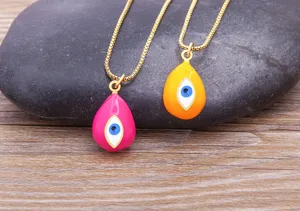 Close-up of colorful teardrop evil eye pendant necklaces with 18k gold plated box chains.