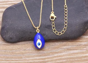 Exquisite gold plated evil eye teardrop pendant necklace detail view, fashion charm jewelry.