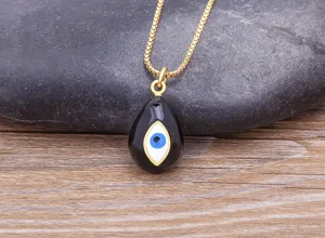 Gold plated evil eye teardrop pendant necklace for women, elegant fashion jewelry style.