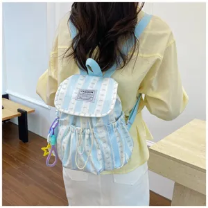 Detail view of casual striped backpack back view, cute bow style design for daily use.
