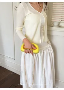 Yellow metal handle clutch bag crossbody retro aesthetic minimal design chic style accessory