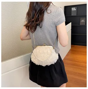 Elegant pearl chain crossbody bag with white mesh roses, retro shell clutch for summer fashion.