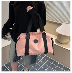 Pink large capacity travel duffel bag, casual sports fitness gym bag with shoulder strap.