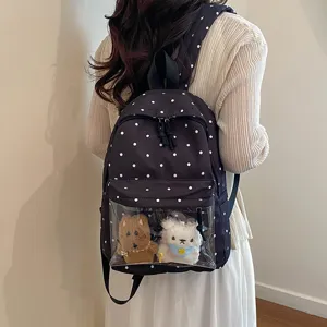 Stylish women polka dot backpack with clear front pocket and cute plush toys for daily use