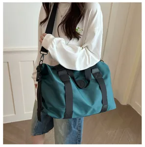 Detail view of the large capacity casual travel duffel bag, showcasing practical design.