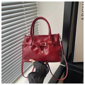 Red minimalist women shoulder handbag casual crossbody tote bag with stylish belt buckle detail.