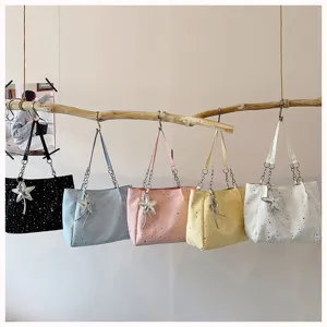 Shiny star tote shoulder bag with chain strap and cute pendant for daily casual commuting.
