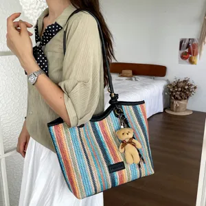 Colorful woven straw tote bag for women, large capacity summer beach vacation shoulder bag.