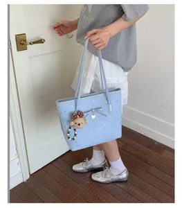 Fashionable large capacity tote bag for women, star print bow PU leather shoulder bag.