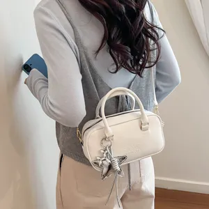 Spring fashion women solid color shoulder crossbody bag with star charm for daily style.