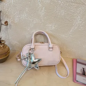 Pink leather fashion women handbag shoulder crossbody bag with silver star charm detail view
