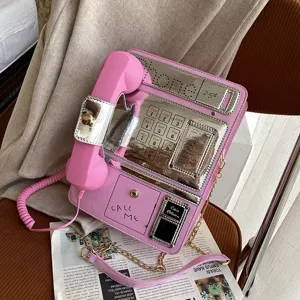 Rosa Retro Telefon Umhängetasche mit Kette und lustigem Hörer für Damen und Mädchen.