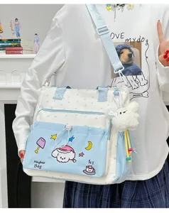 Niedliche Canvas Umhängetasche für Schüler mit Stickerei und Plüschanhänger für den Alltag.