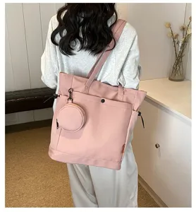 Stylish pink canvas tote bag with a small coin purse, large capacity casual shoulder bag.