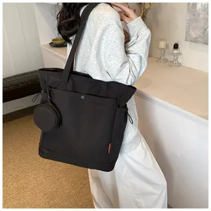 Black canvas tote bag with coin purse, large capacity shoulder bag for women daily use.